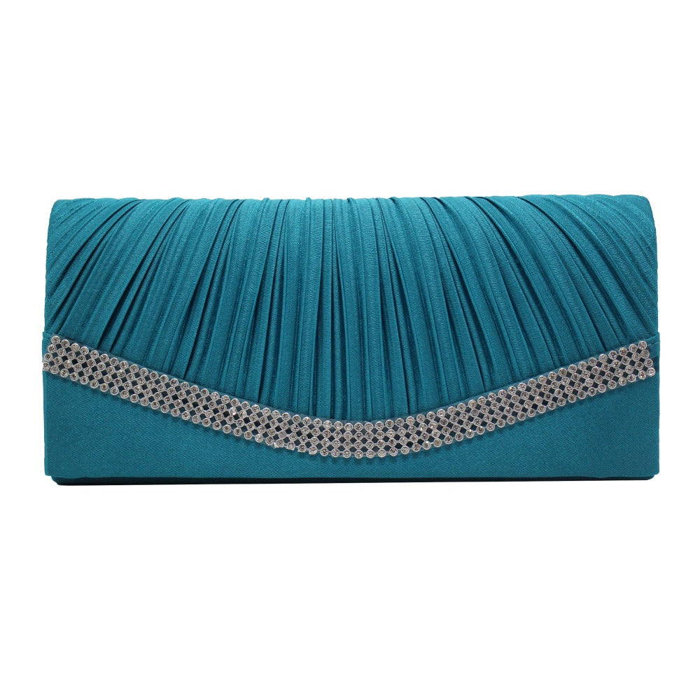 This elegant clutch is perfect for Pakistani women attending weddings, parties, or formal dinners.