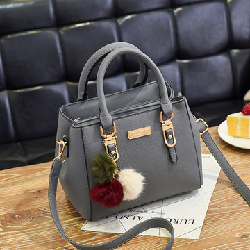 Black Women's Handbag with Pom Pom Charm Shoulder Crossbody Loved by 180+
